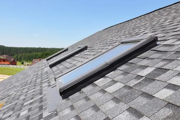 dreamstime_m_142426968 Skylights windows on modern house roof top