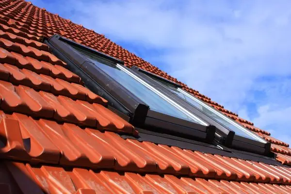 dreamstime_m_15789044 Roof windows modern sky new metal ekology clouds two